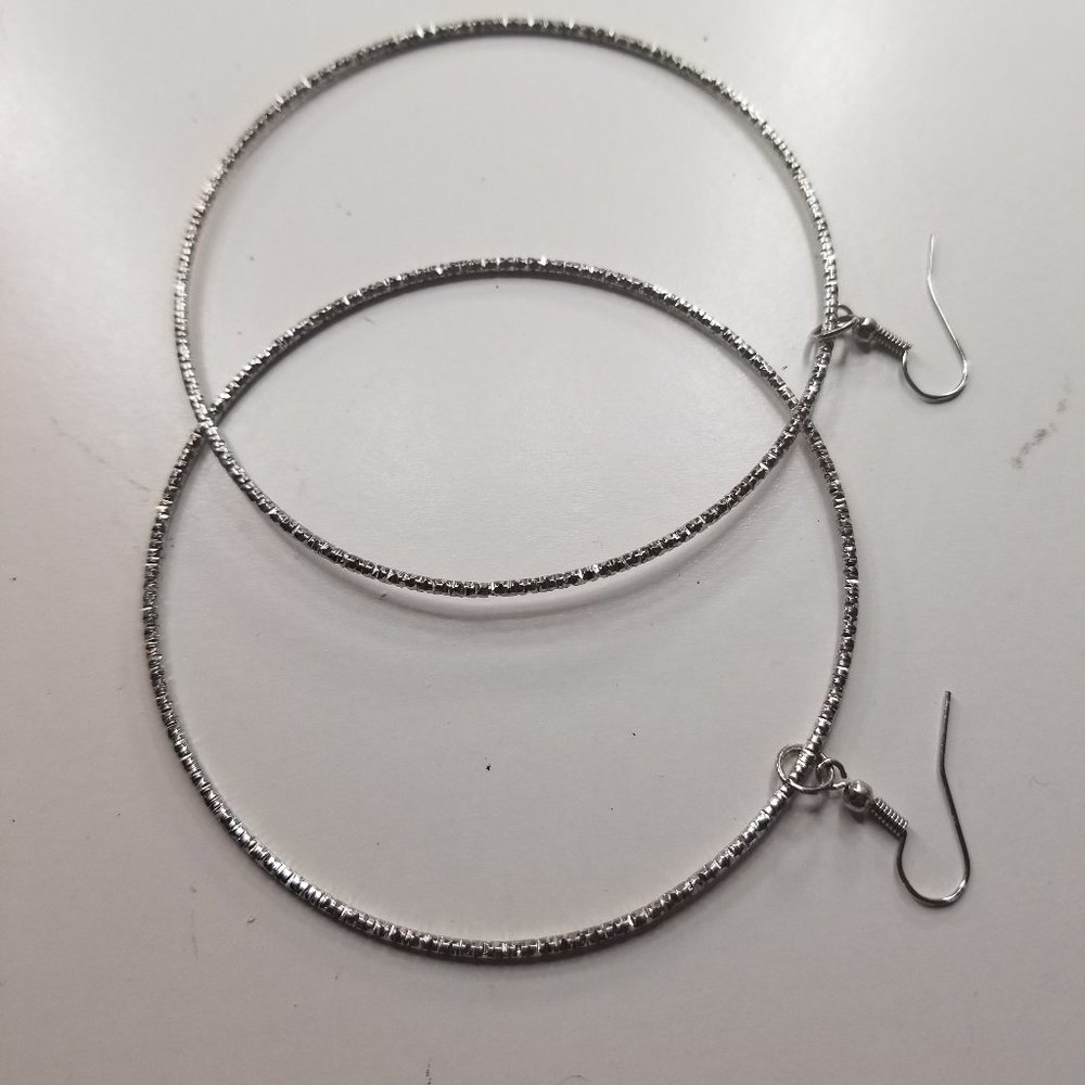 Big silver hoop earrings